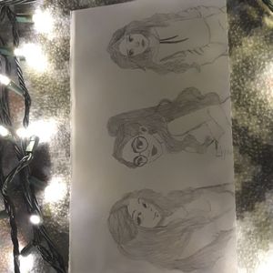 Drawings of three girls